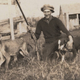 Wilfred Batty posing with the last thylacine known to have been shot in the wild, 1930.
